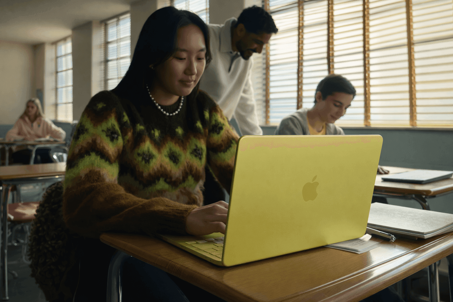 Apple MacBook Neo concept laptop on desk showing slim design and Retina display
