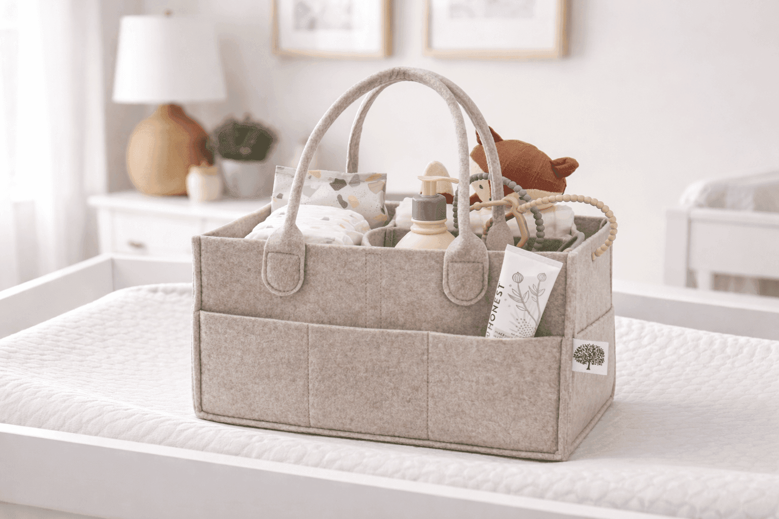 Parker Baby Diaper Caddy organizer with diapers, wipes, and baby essentials in nursery