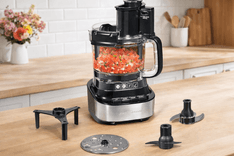 Hamilton Beach Stack & Snap Food Processor with chopped vegetables on kitchen counter