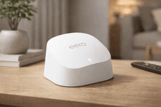 Amazon eero 6 mesh wifi add-on extender plugged into wall outlet improving home WiFi coverage