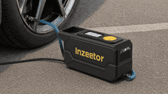 Portable Inzeetor air compressor inflating car tire with digital pressure display outdoors