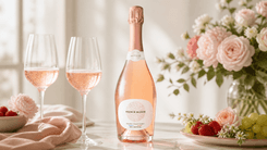 French Bloom Le Rosé Sparkling Wine bottle with pale pink hue and elegant packaging displayed on a table