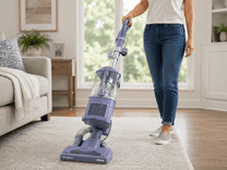 Shark NV352 Navigator Lift Away Upright Vacuum cleaning pet hair from carpeted living room floor