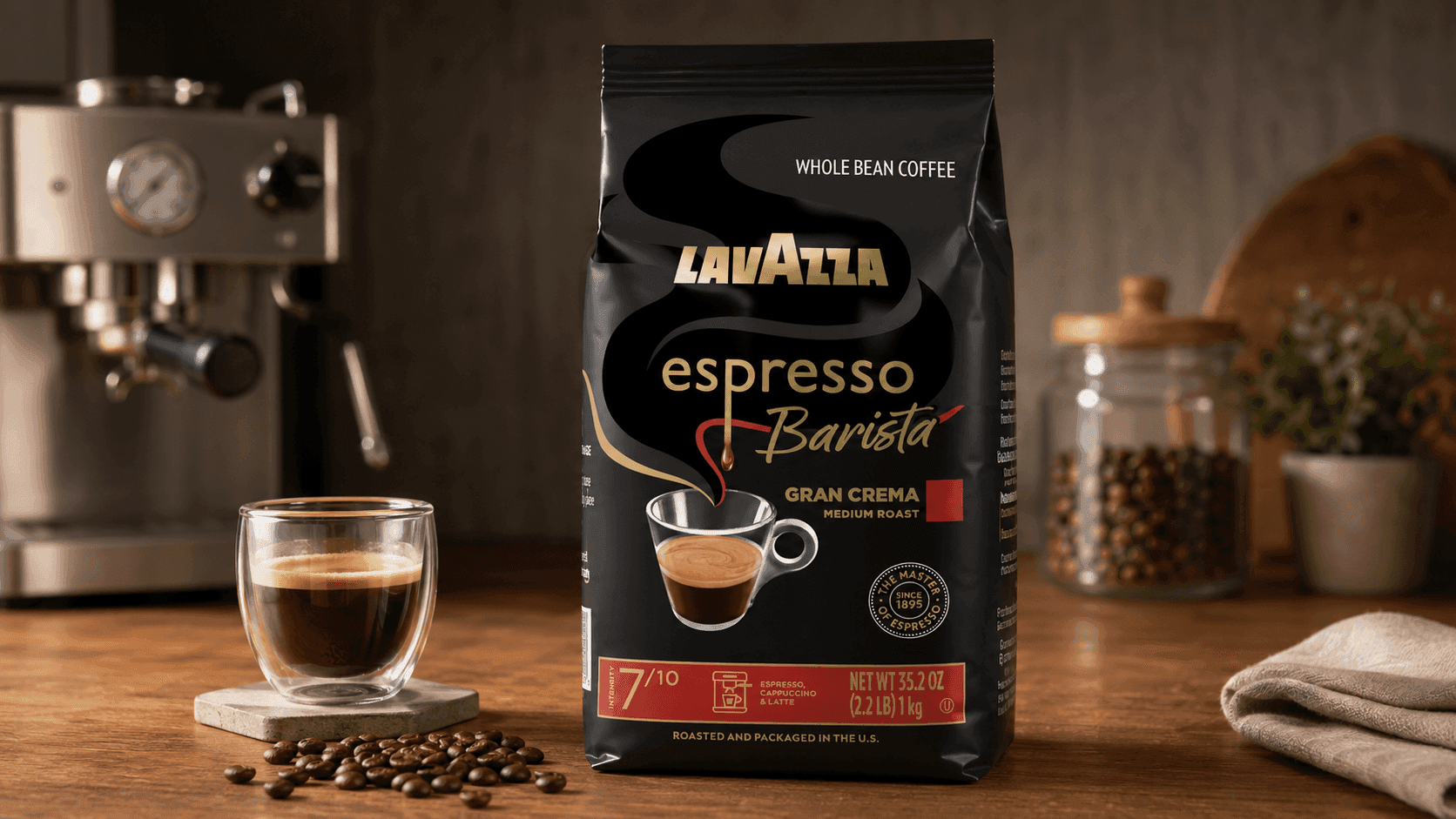 Lavazza Espresso Barista Gran Crema whole bean coffee beside fresh espresso shot and grinder
